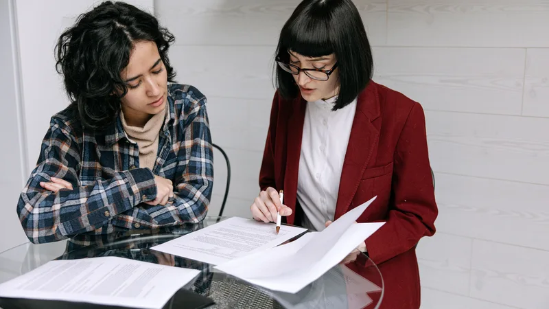 Reviewing loan agreement — comparing Credit Cube alternatives and signing documents